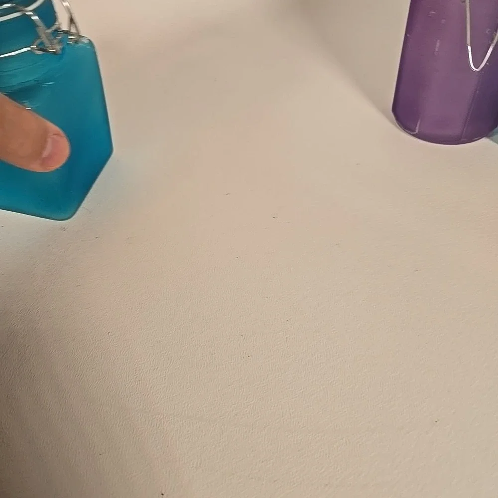 Set Of Four Colored‎ Glass Cannisters With Locking Tops Very Good Condition